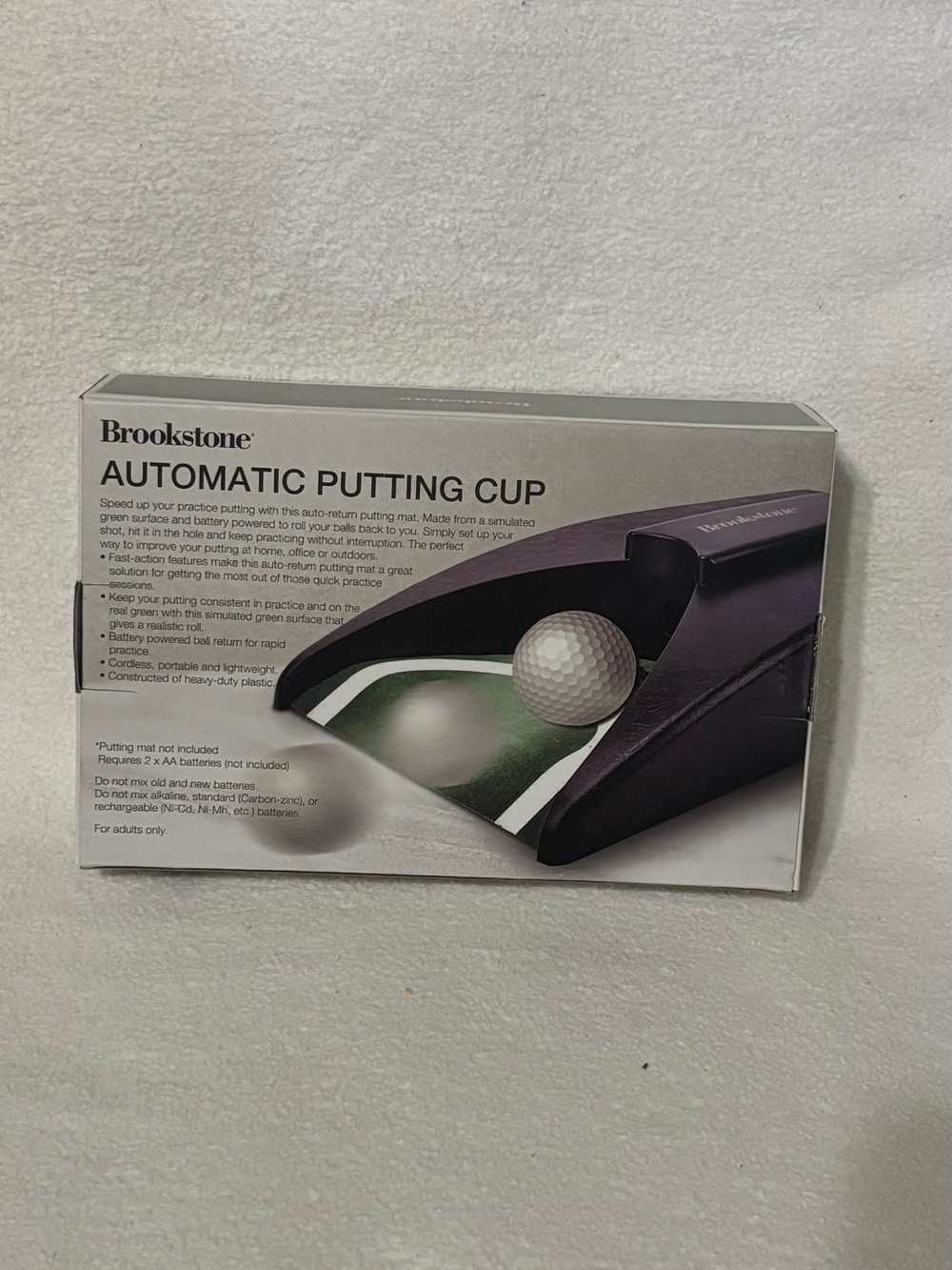 Brookstone Portable Putting Practice Cup in Black and Green